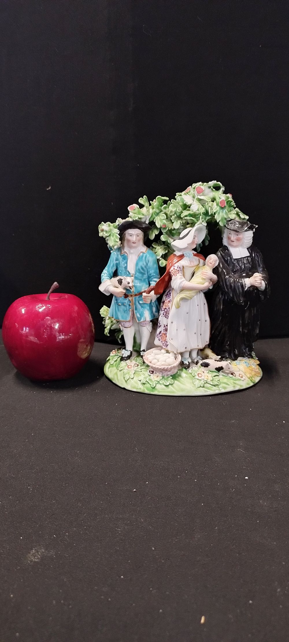 Lot 422: Staffordshire pearl wear Tithe Tythe pig figure group....