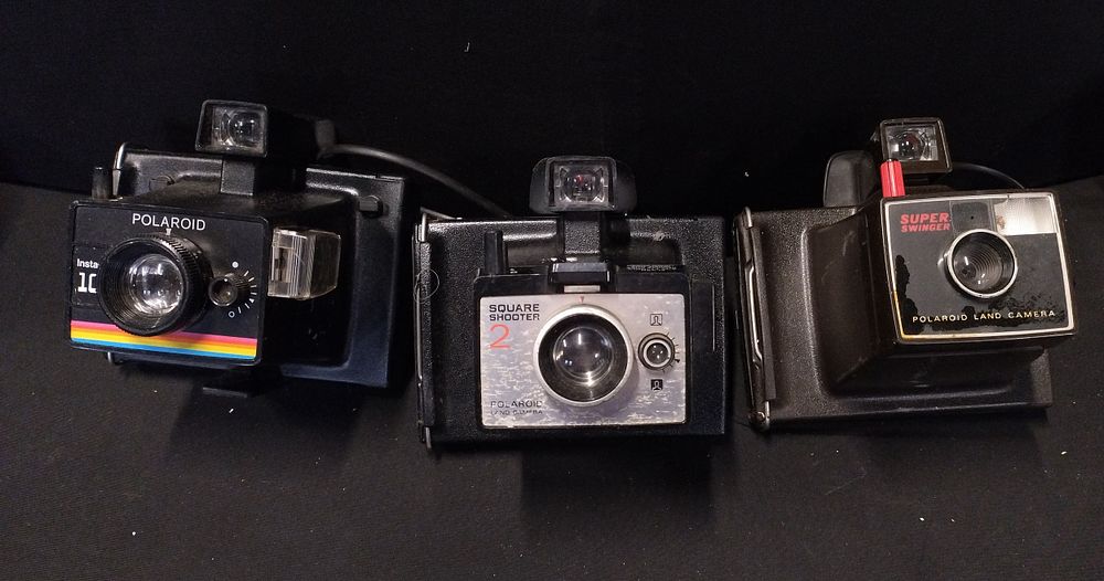 Lot 459: 3 vintage Polaroid cameras