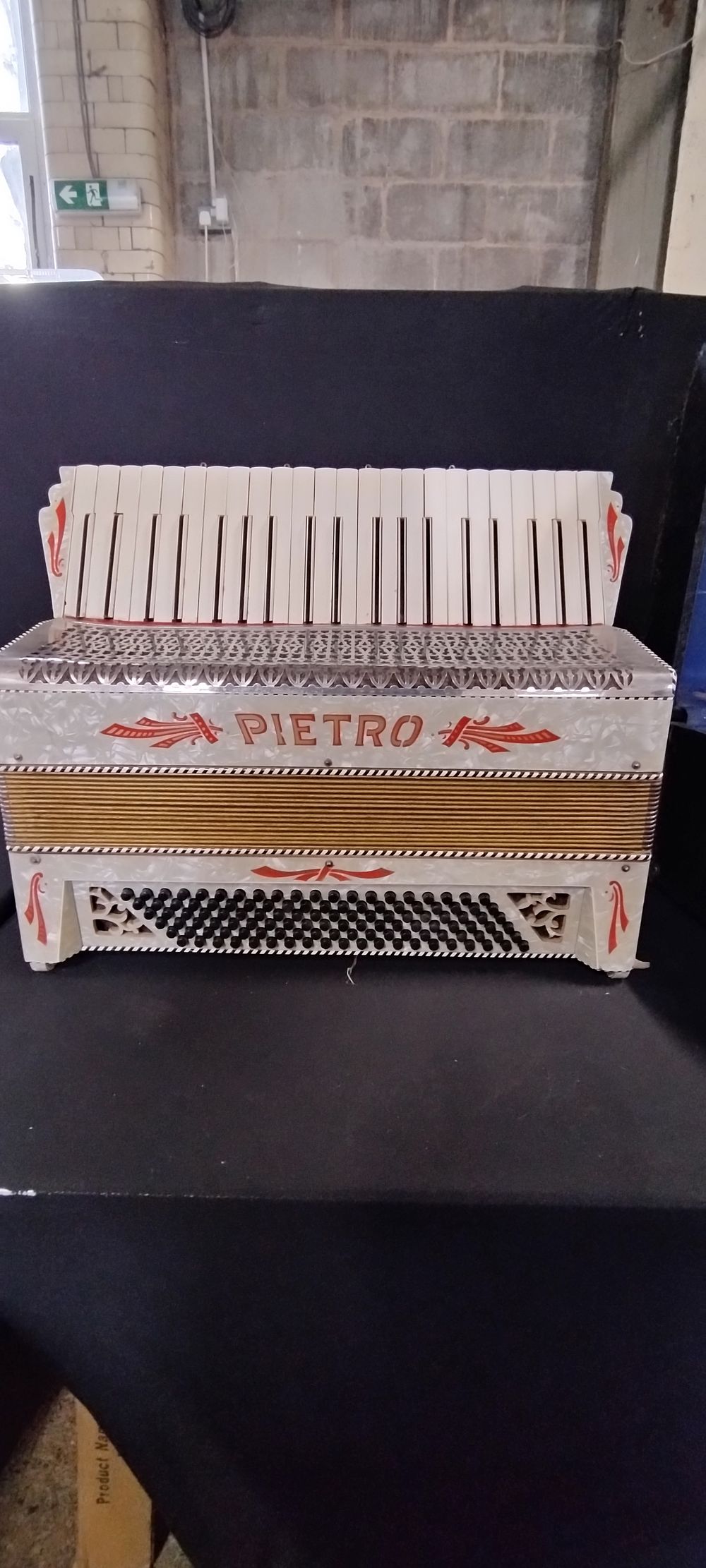 Lot 479: Vintage German Pietro Accordion, with ivory shimmer veneer...