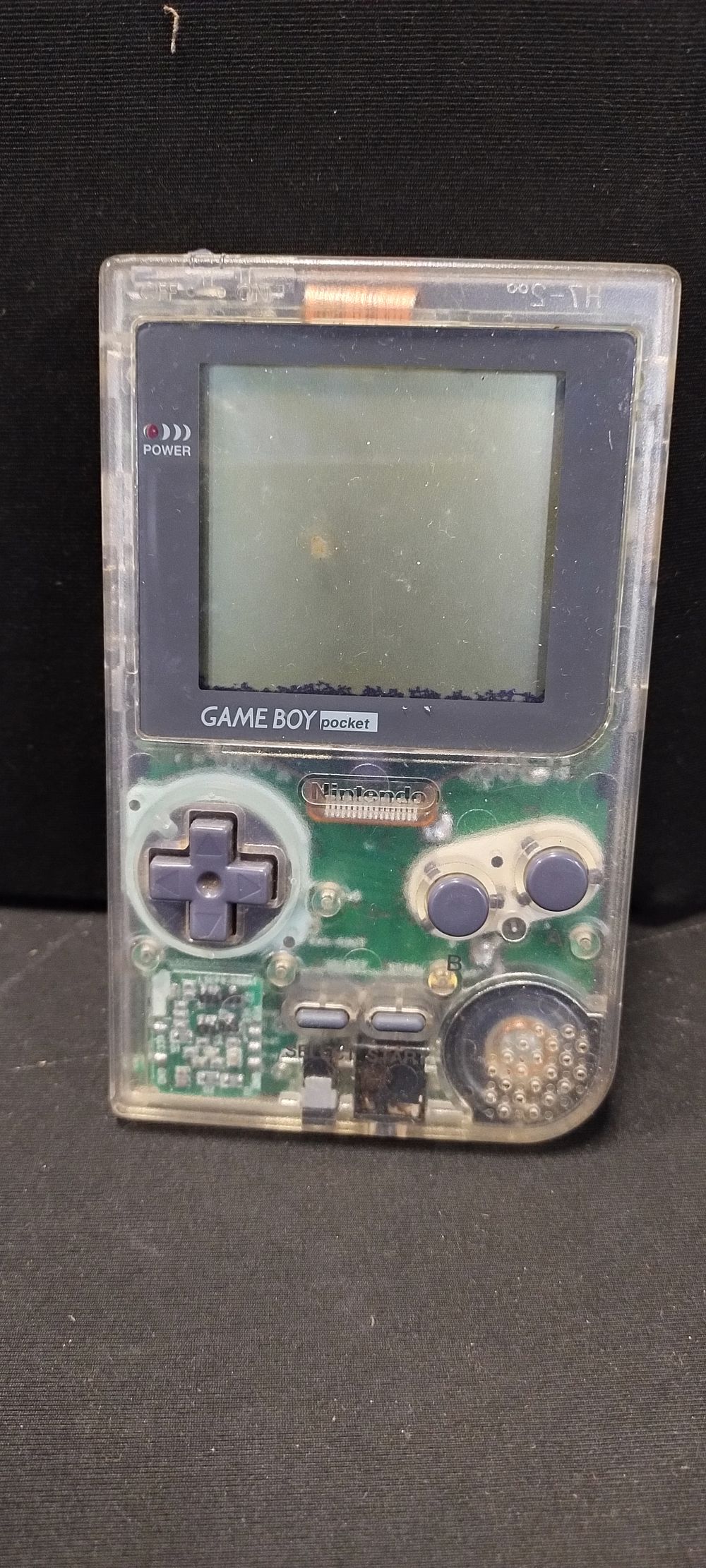 Lot 482: Nintendo clear Gameboy pocket handheld games console