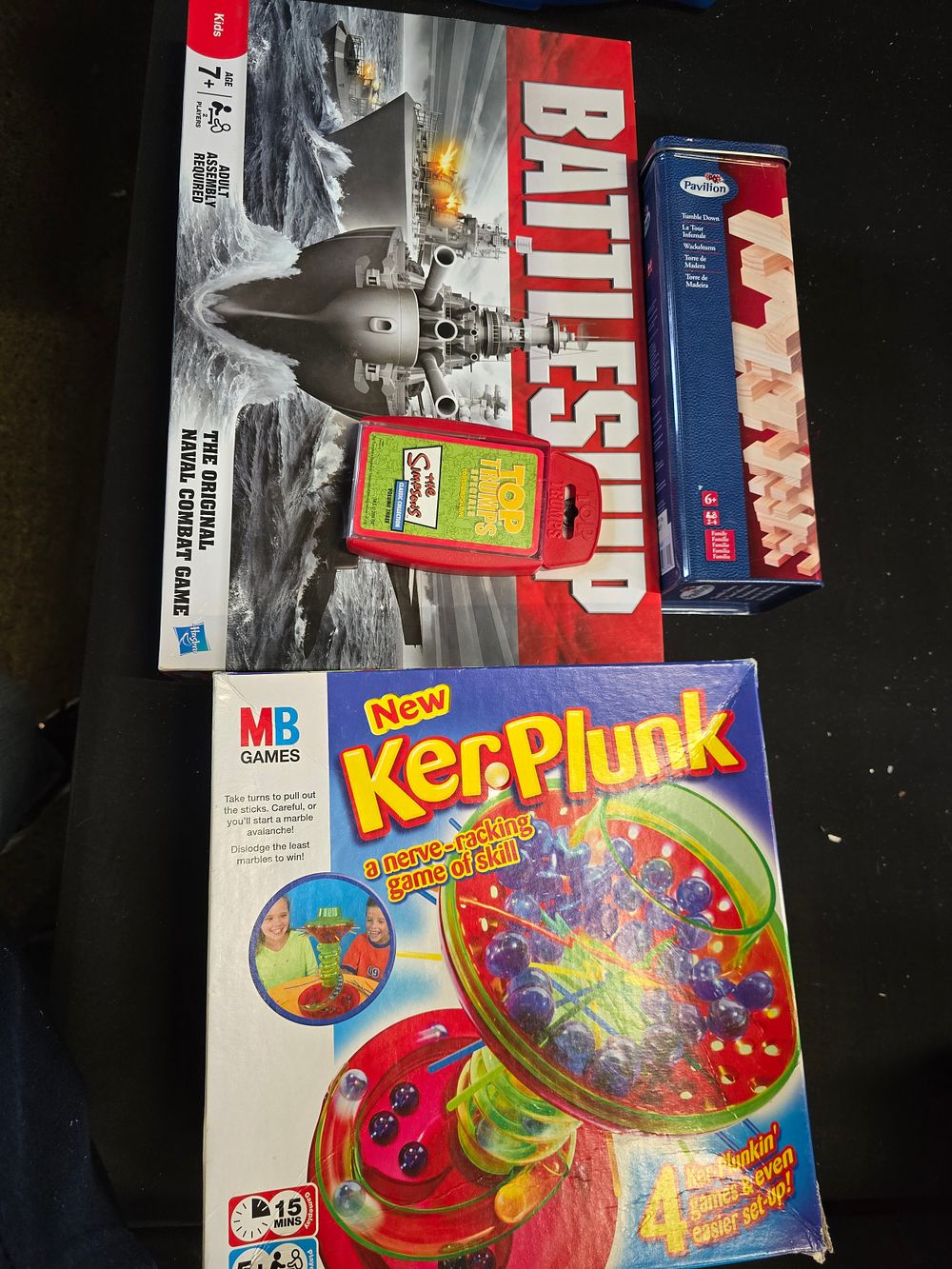 Lot 495: A selection of games. Includes battleships and kerplunk