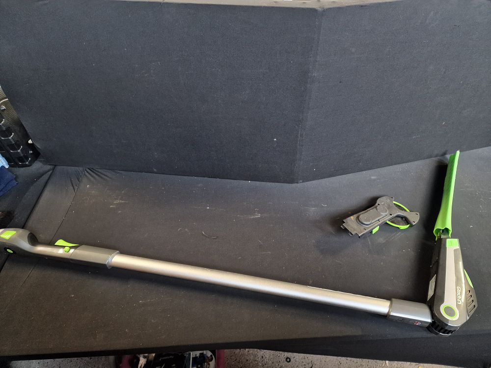 Lot 182: GTech 18v Cordless Hedge Trimmer and Extra Attachment Tested for Power. No Charger