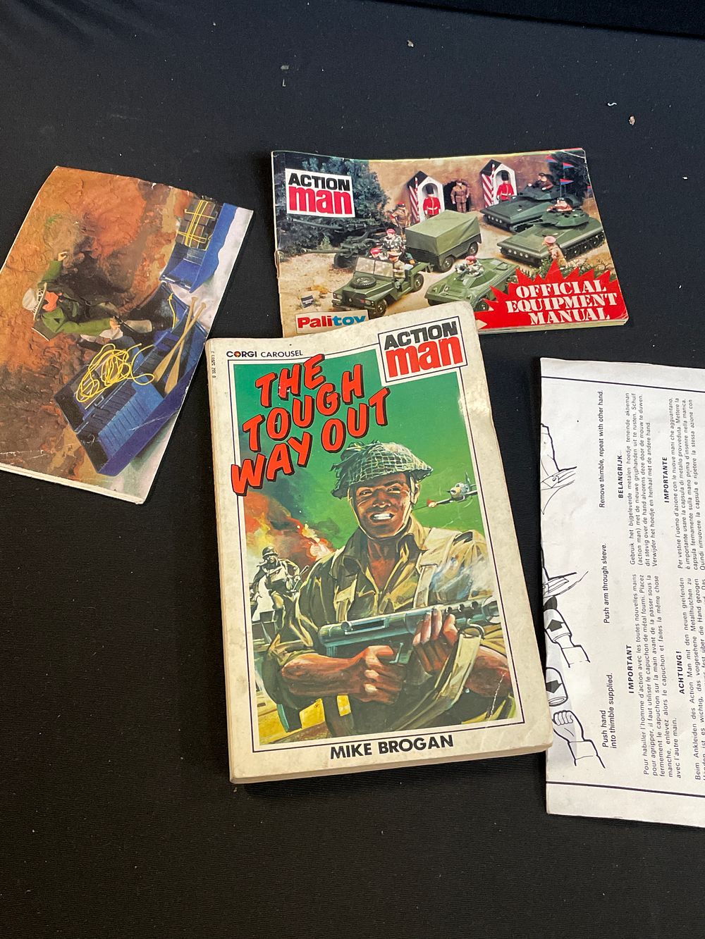 Lot 211: Vintage books palitoy and Corgi
