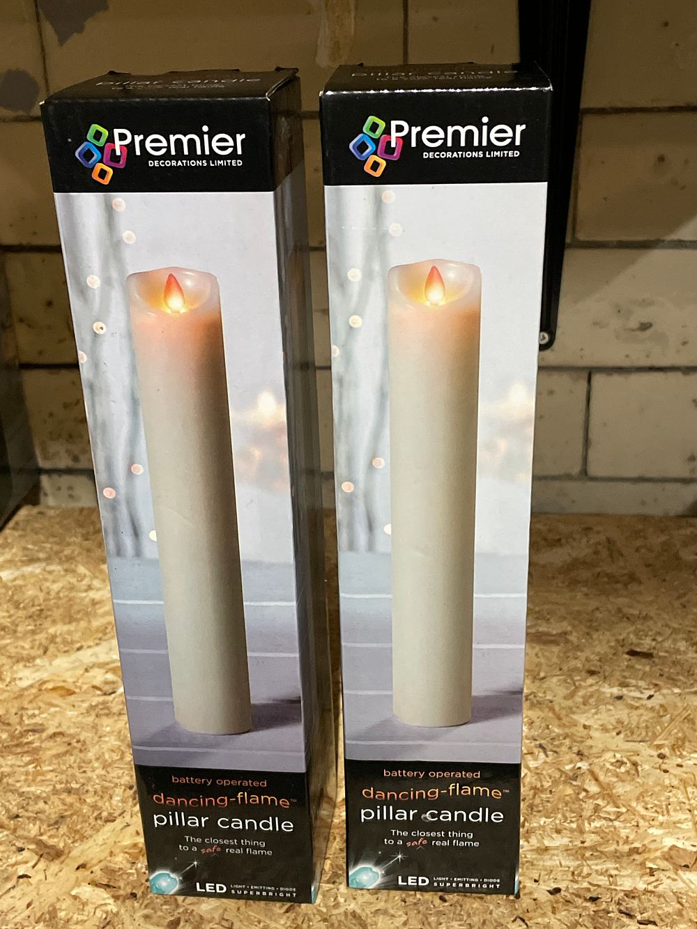 Lot 279: 2 premier dancing flame pillar candles unchecked