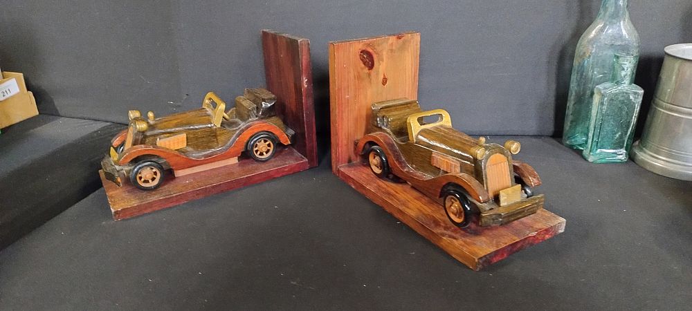 Lot 214: Two wooden vintage car bookends