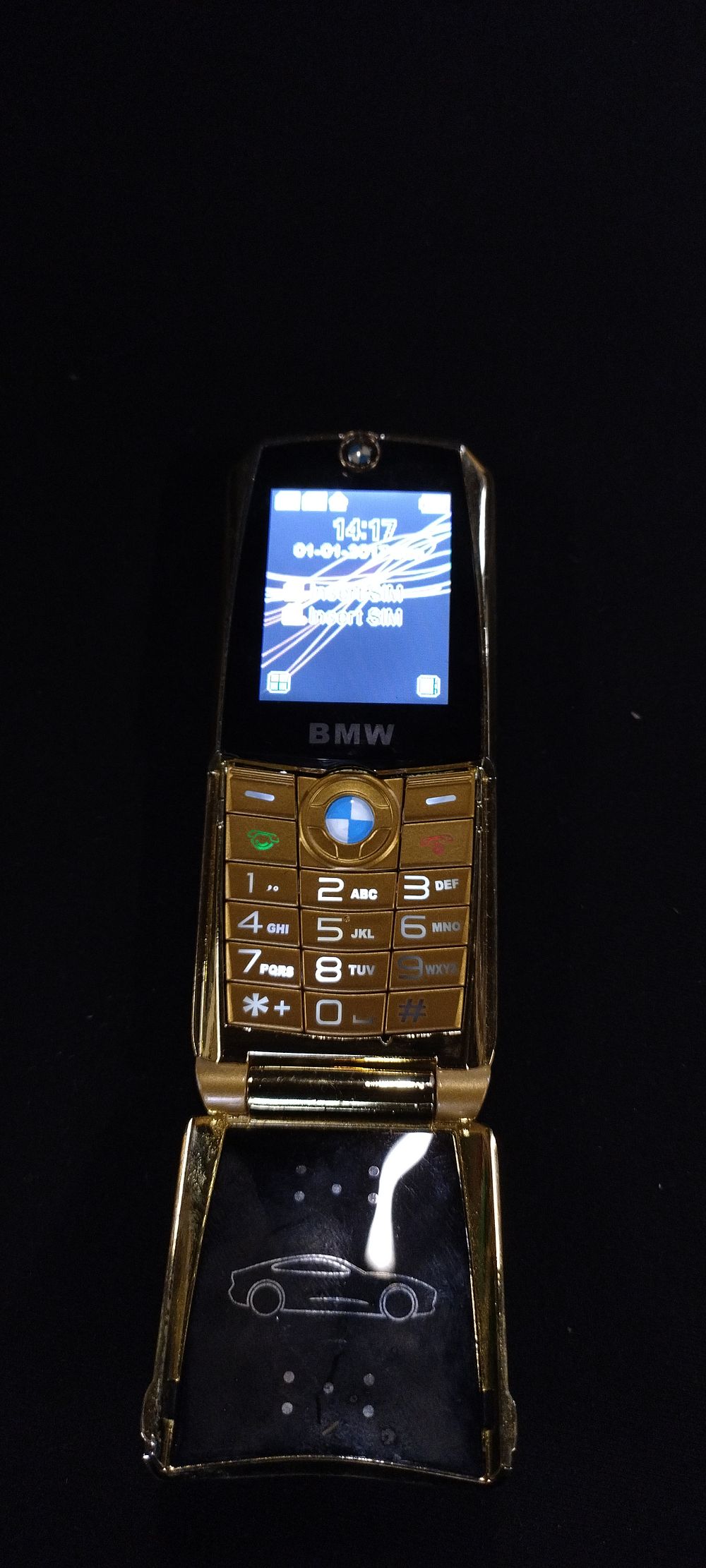 Lot 227: BMW 760 gold coloured mobile phone in working...