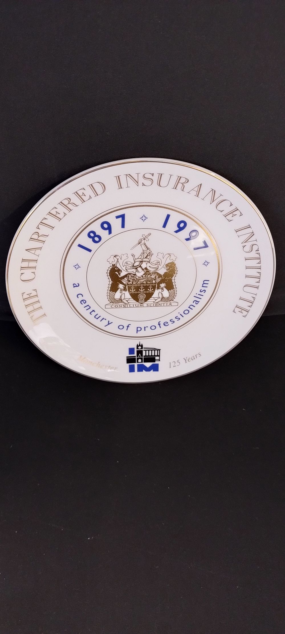 Lot 257: Royal Doulton plate decorated for the Chartered Insurance...