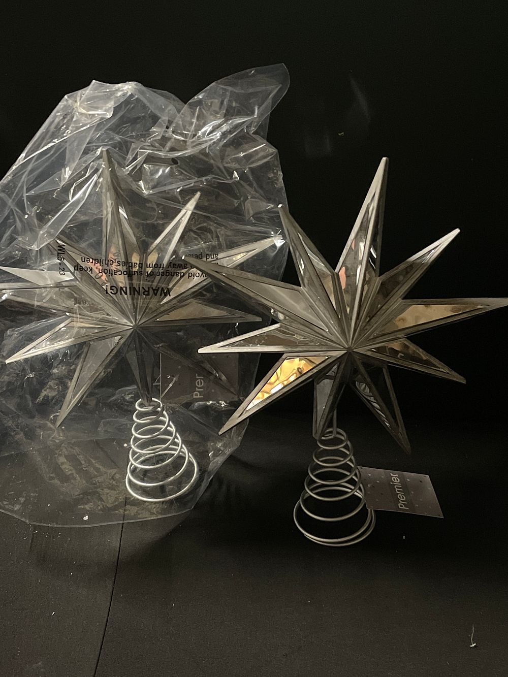 Lot 291: 2 x star Christmas tree toppers