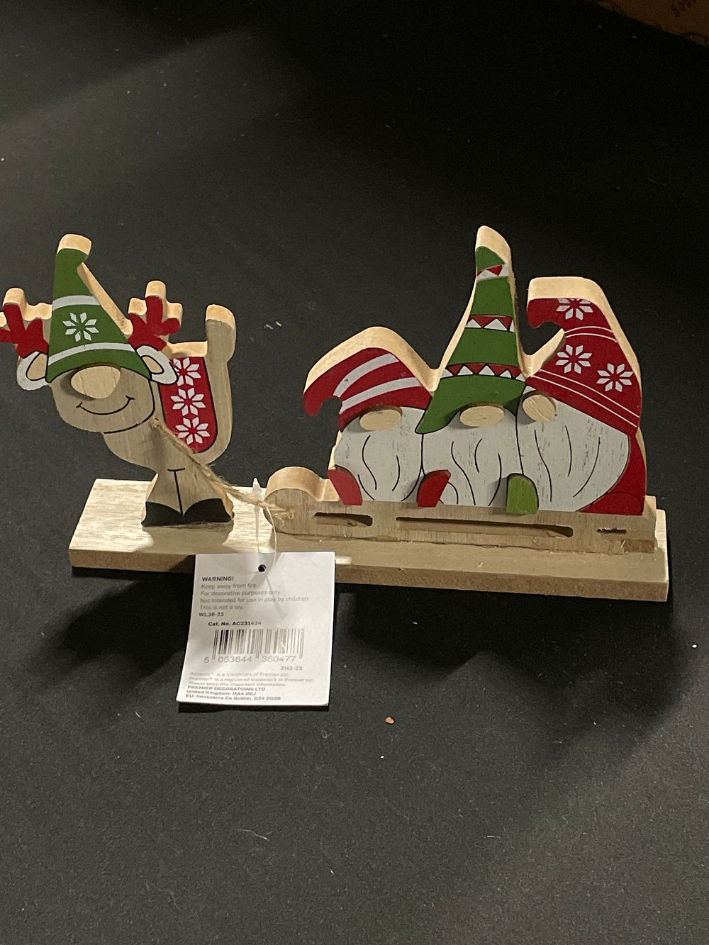 Lot 292: Wooden gong elf decoration