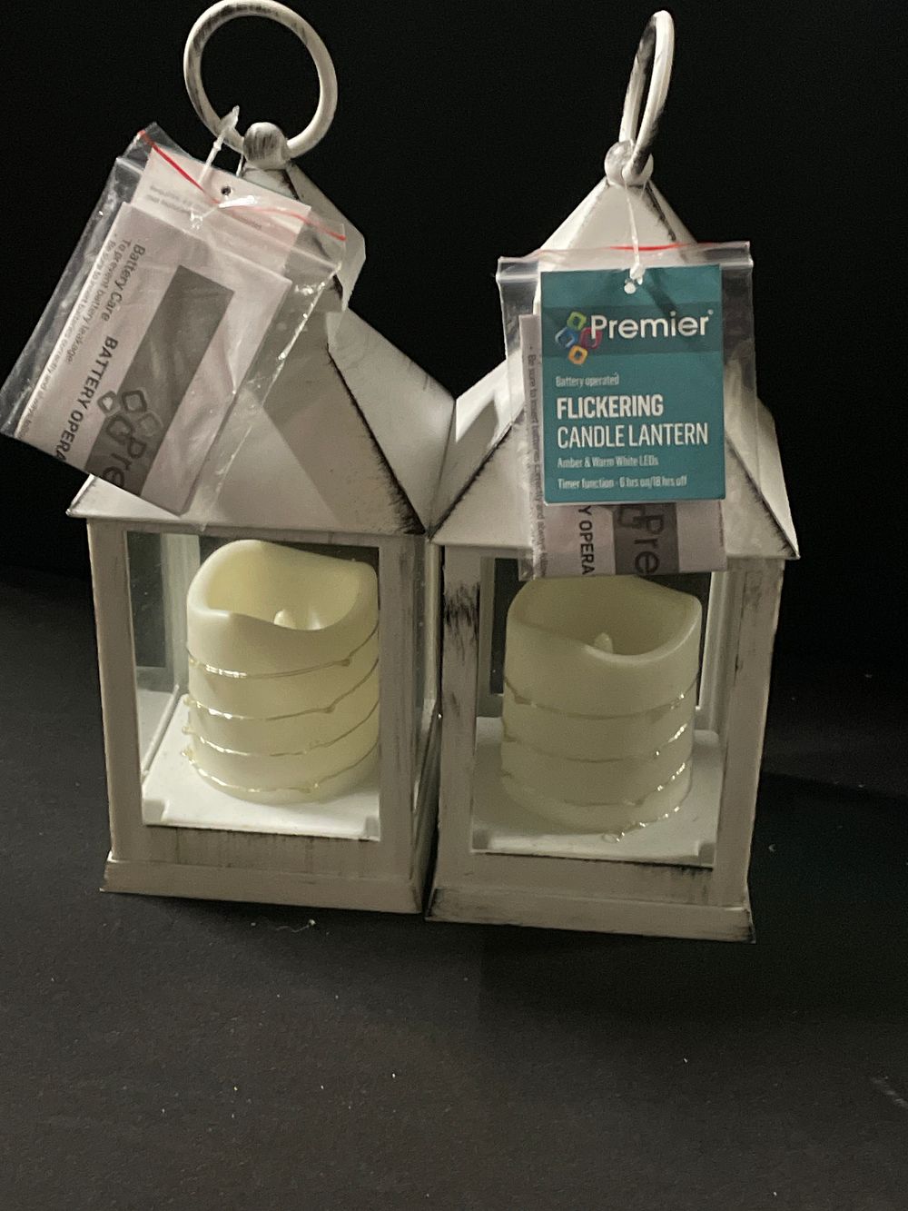 Lot 296: Pair of flickering candle lanterns