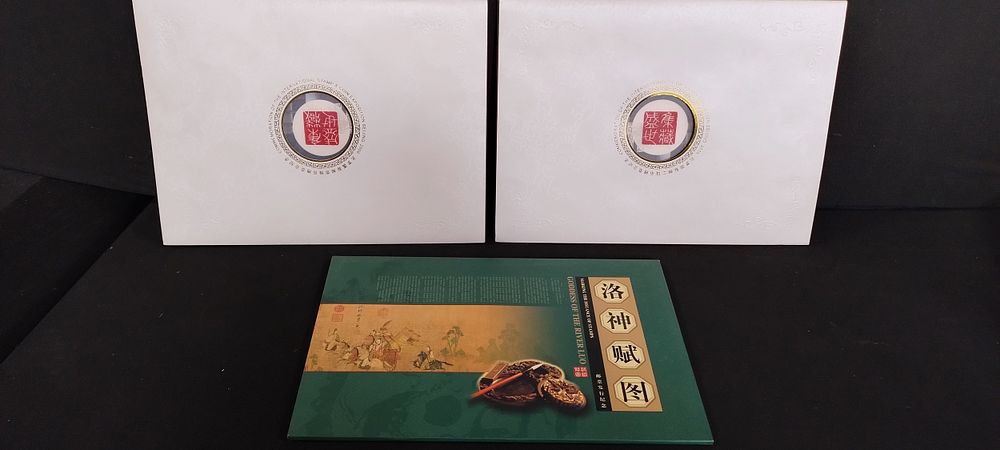 Lot 274: Three oriental designs first day books of stamps...