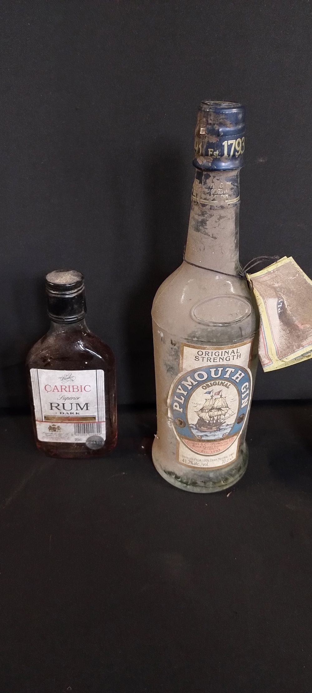 Lot 286: Two bottles of unopened alcohol. Plymouth Gin and...