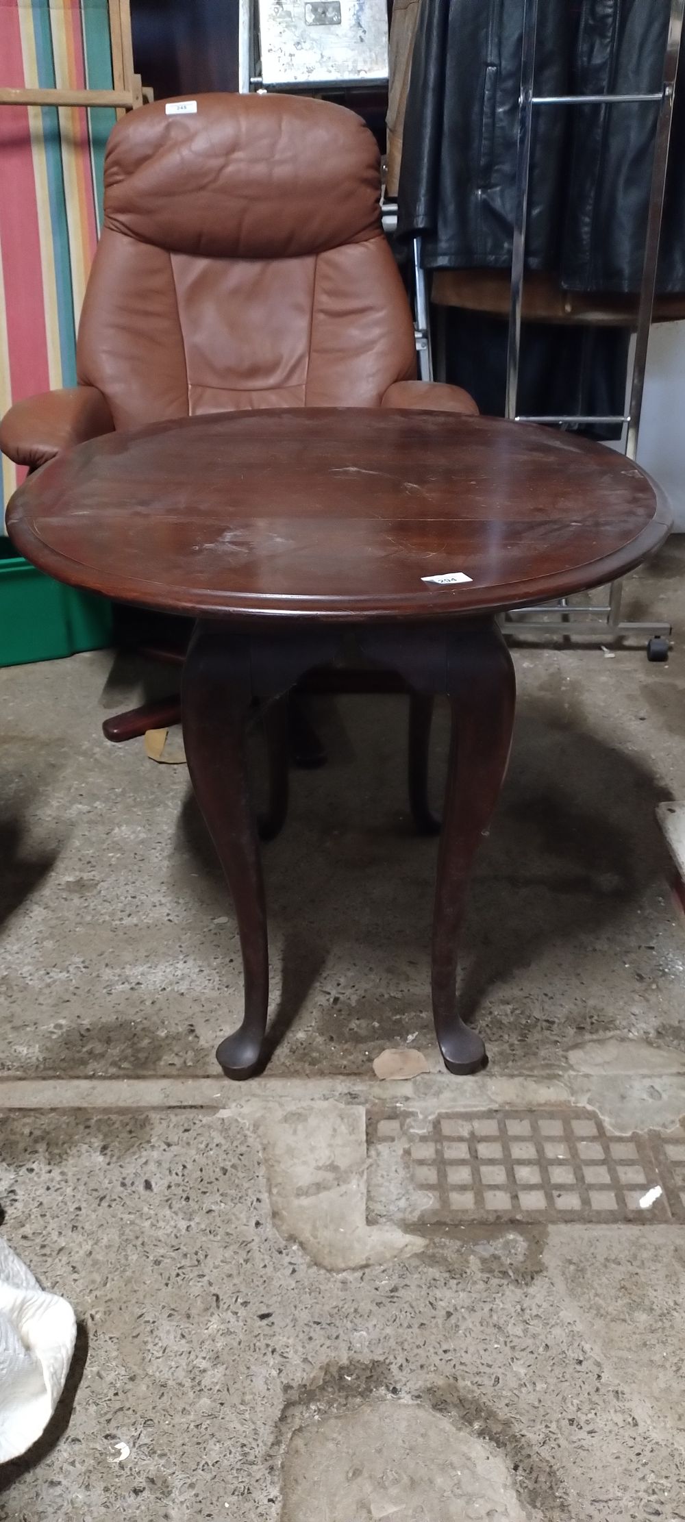 Lot 294: Dark wood table. Measures approx H 64 x...
