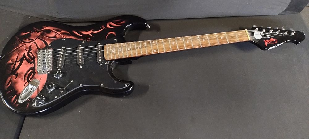 Lot 306: Jacksville Electric Guitar with plectrum