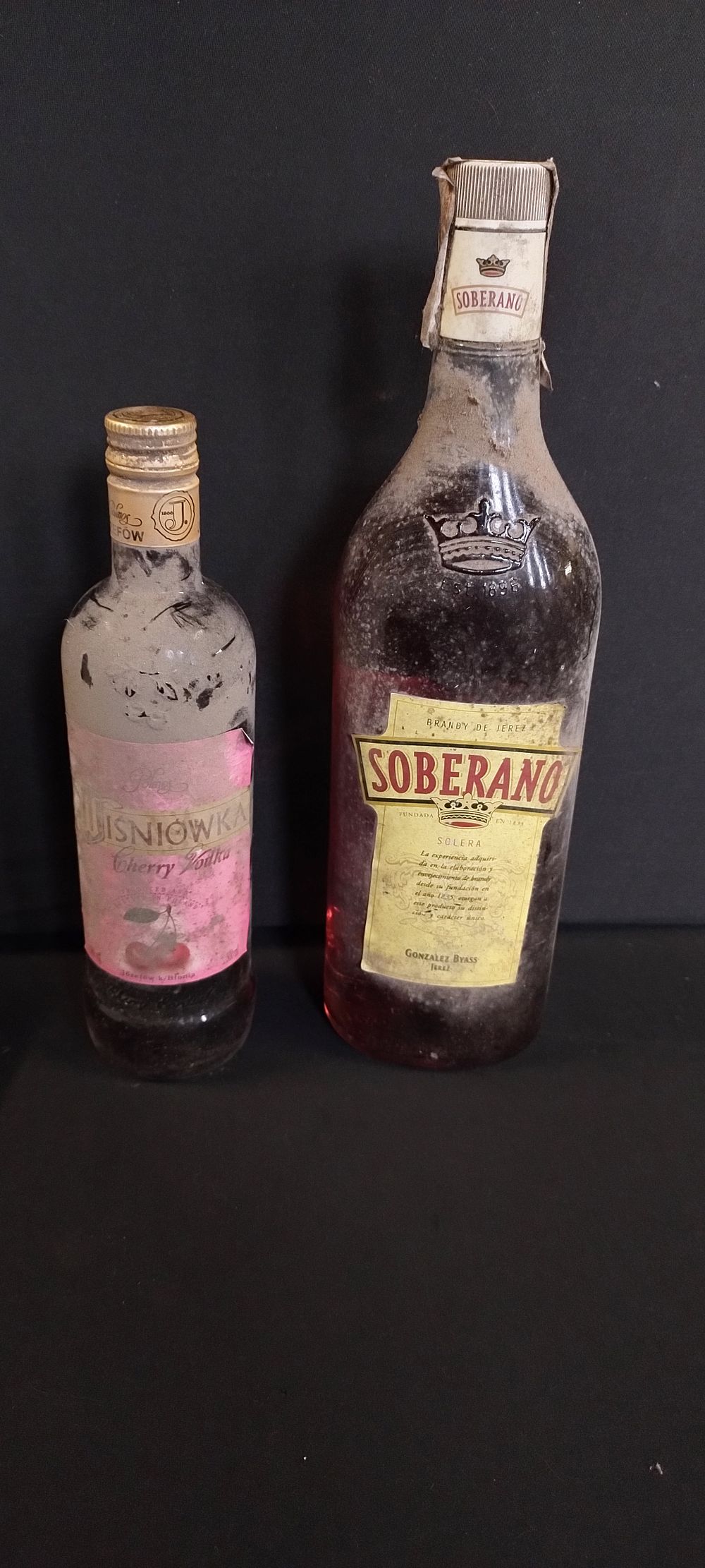 Lot 312: Two bottles of unopened alcohol. Soberano brandy, and...