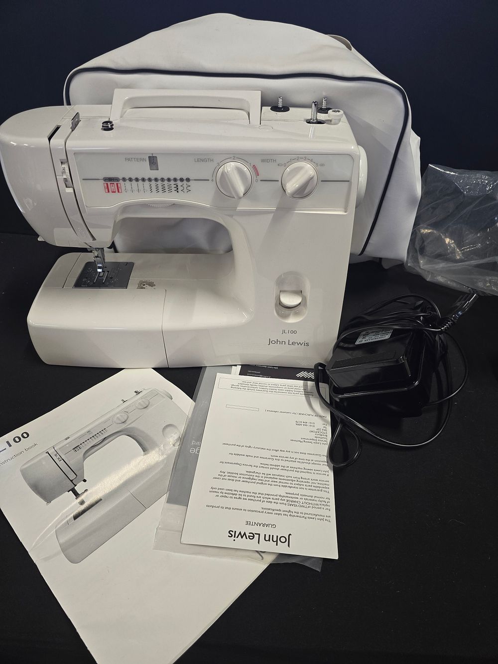 Lot 333: John Lewis JL100 sewing machine, with peddle, cover...