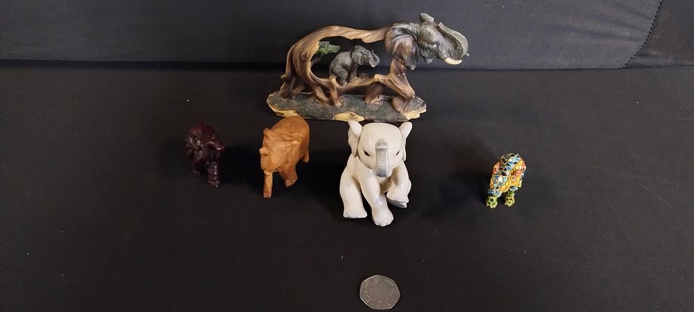 Lot 335: 5 various pottery and wooden Elephants including a...