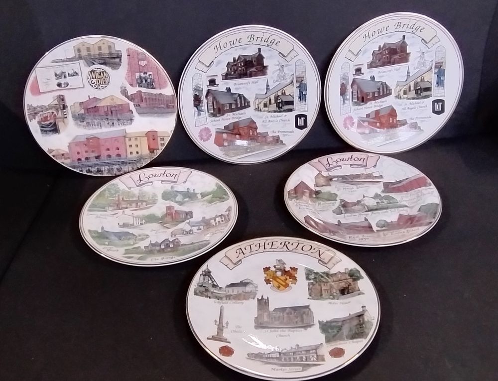 Lot 359: Edwardian Porcelain plates depicting towns from bygone era,...