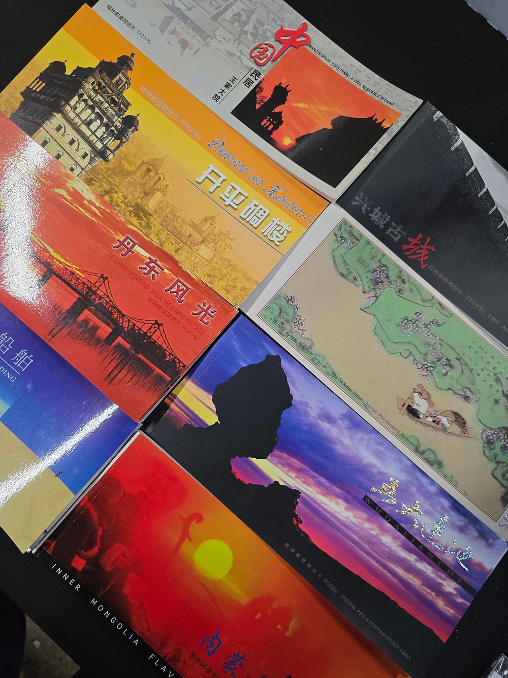 Lot 395: A collection of eight full pre stamped postcards....