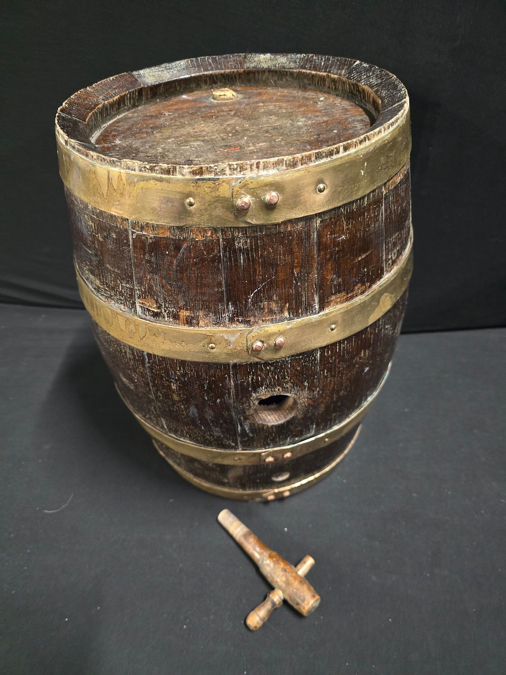 Lot 423: Wood and brass whiskey/beer barrel.