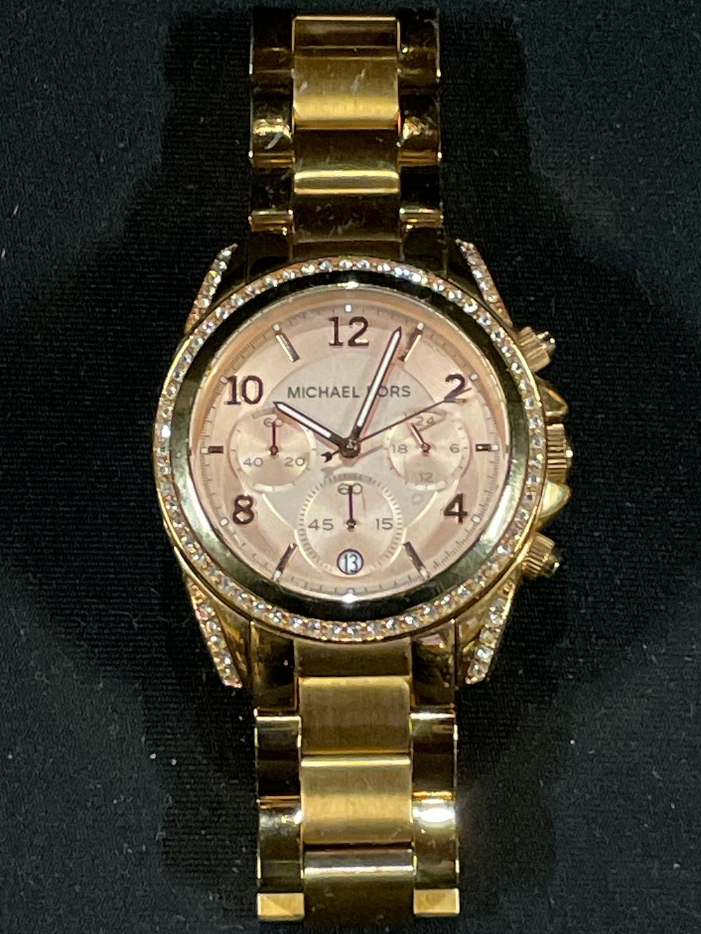 Lot 442: Ladies Rose Gold Micheal Kors diamanté faceted watch