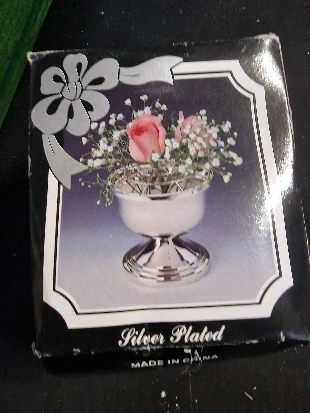 Lot 395: Silver plated posy pot