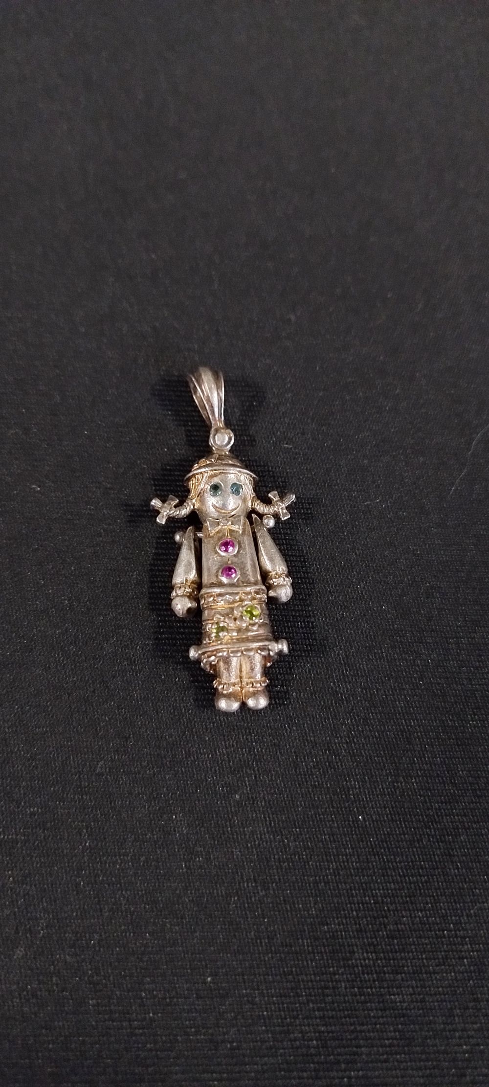 Lot 462: Sterling silver moveable clown pendant with stone eyes...