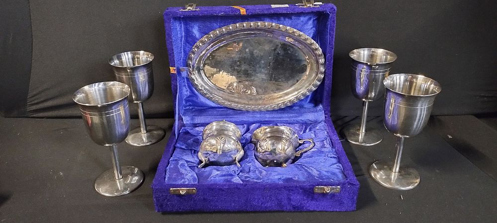 Lot 504: Silver plated tea set comprising of milk jug,...
