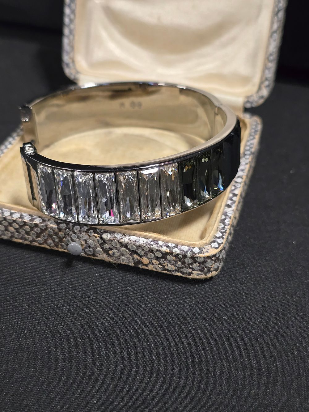 Lot 505: Swarovski three tone bangle.