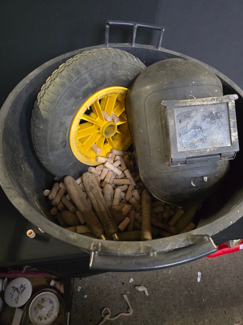 Lot 254: Black Bucket Containing Wheelbarrow Wheel, Weldind Mask, File Handles and a Quantity of Small Wooden Storage Boxes