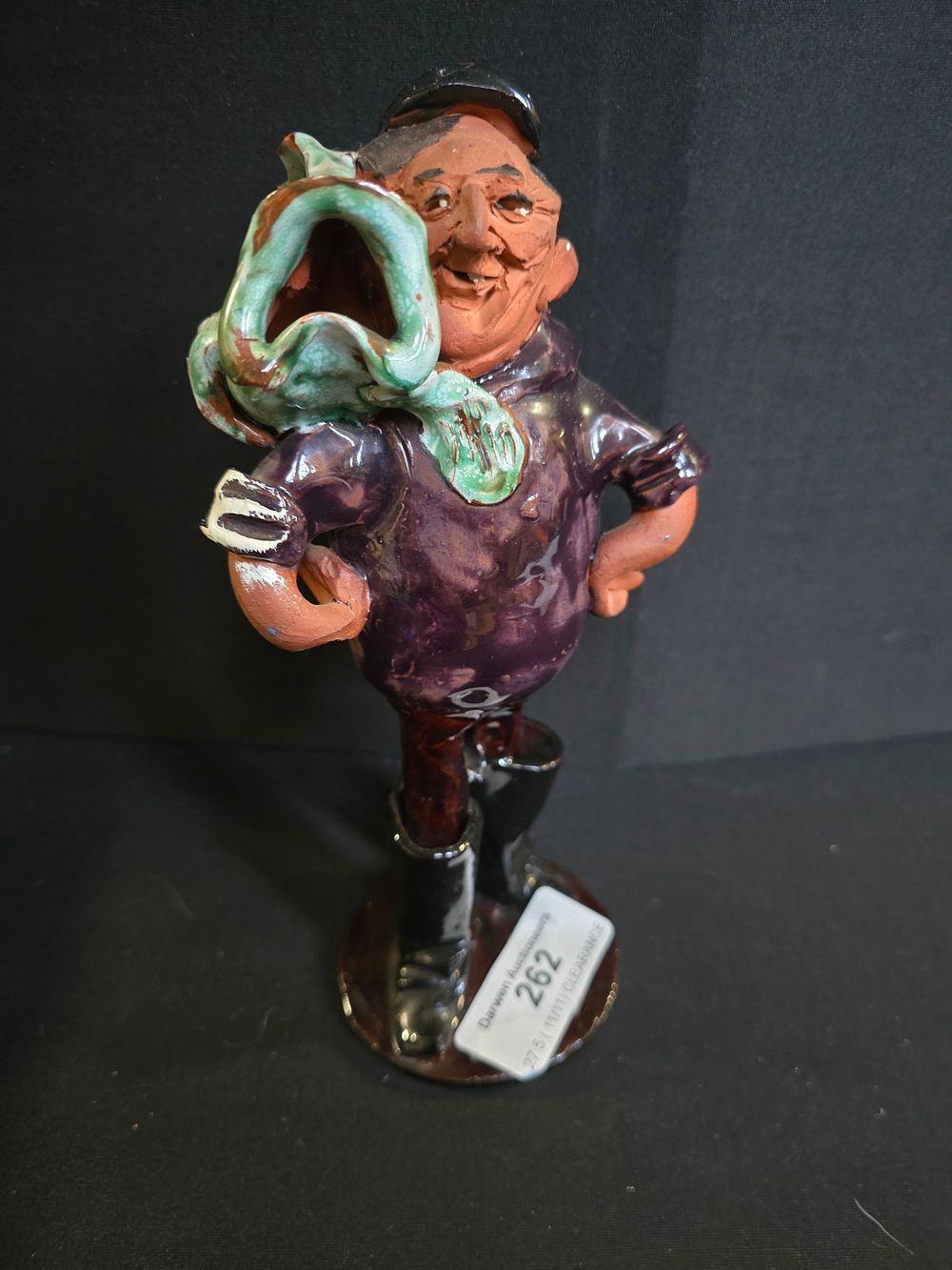 Lot 262: Handmade Fisherman Figure