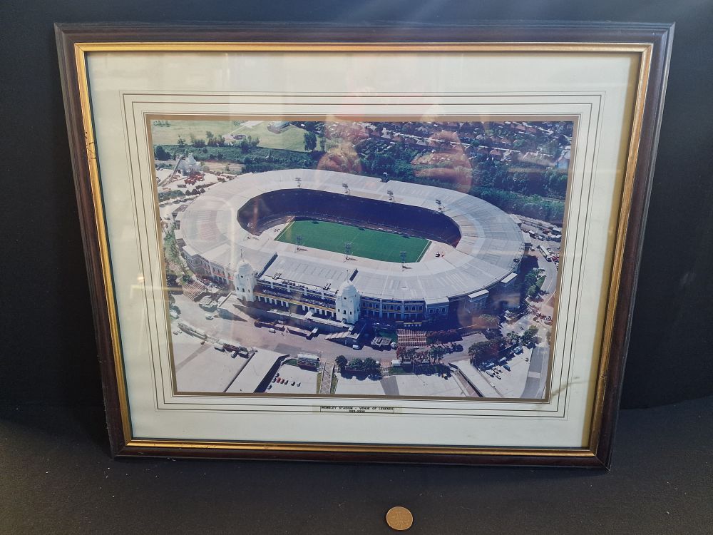 Lot 115: Framed Photo of Wembley Stadium 1923-2000 Venue of Legends Approx 55x45cm