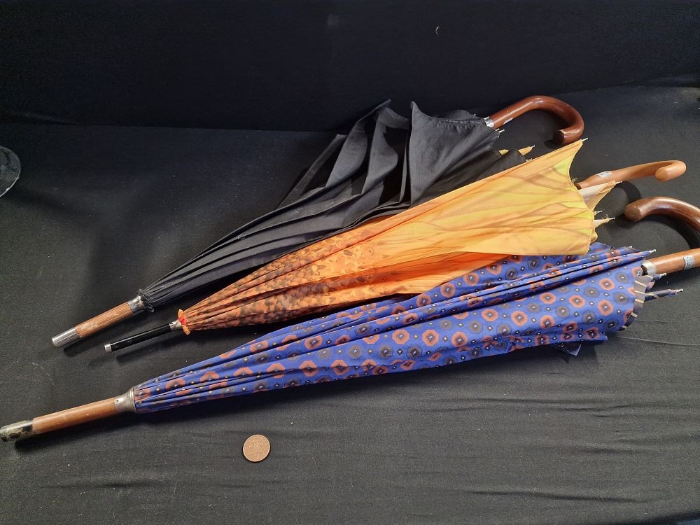 Lot 164: Three Umbrellas. Ideal for the East Lancashire Summers