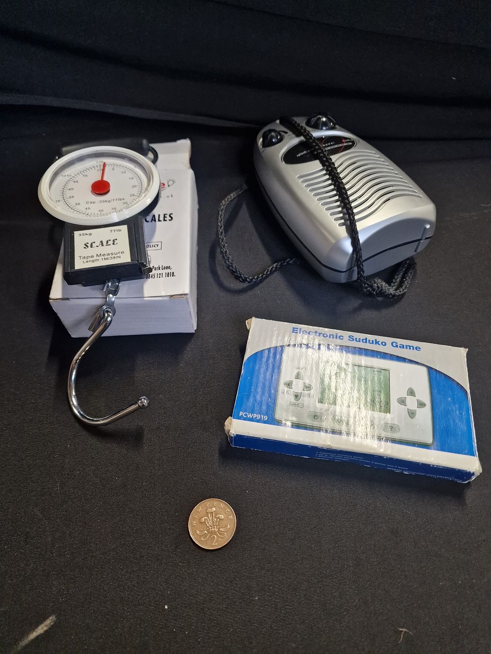 Lot 273: Luggage Scales, Suduko Game and Portable Radio