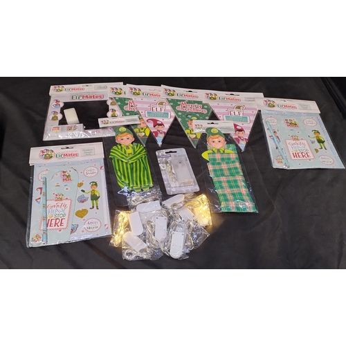 Lot 285: Selection of Elf mates Christmas bunting, message board, activity pack elf clothes, battery operated lights