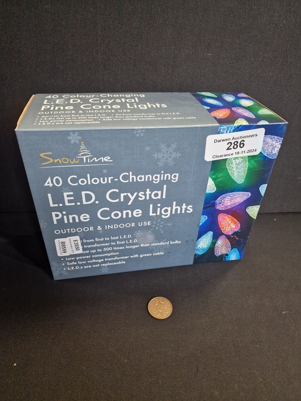 Lot 286: 40 Colour Changing LED crystal pine cone lights. Indoor/Outdoor. Tested and working