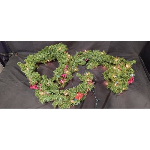 Lot 288: Light up yew tree, berry, apple and roses and lightsChristmas garland. Tested for power