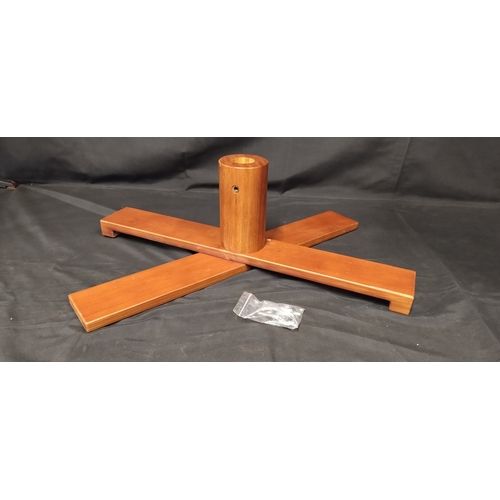Lot 291: Wooden folding Christmas tree holder and anchor screws