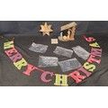 Lot 299: Selection of Christmas items including a Nativity scene and a marqrity star featuring the nativity scene, merry Christmas banner and 5 X bags of silver stars on string