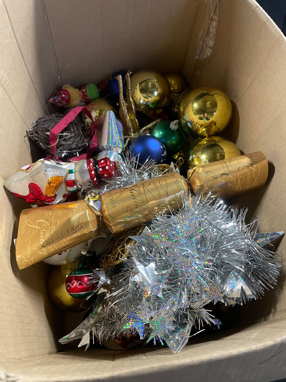 Lot 194: Box of vintage baubles and crackers