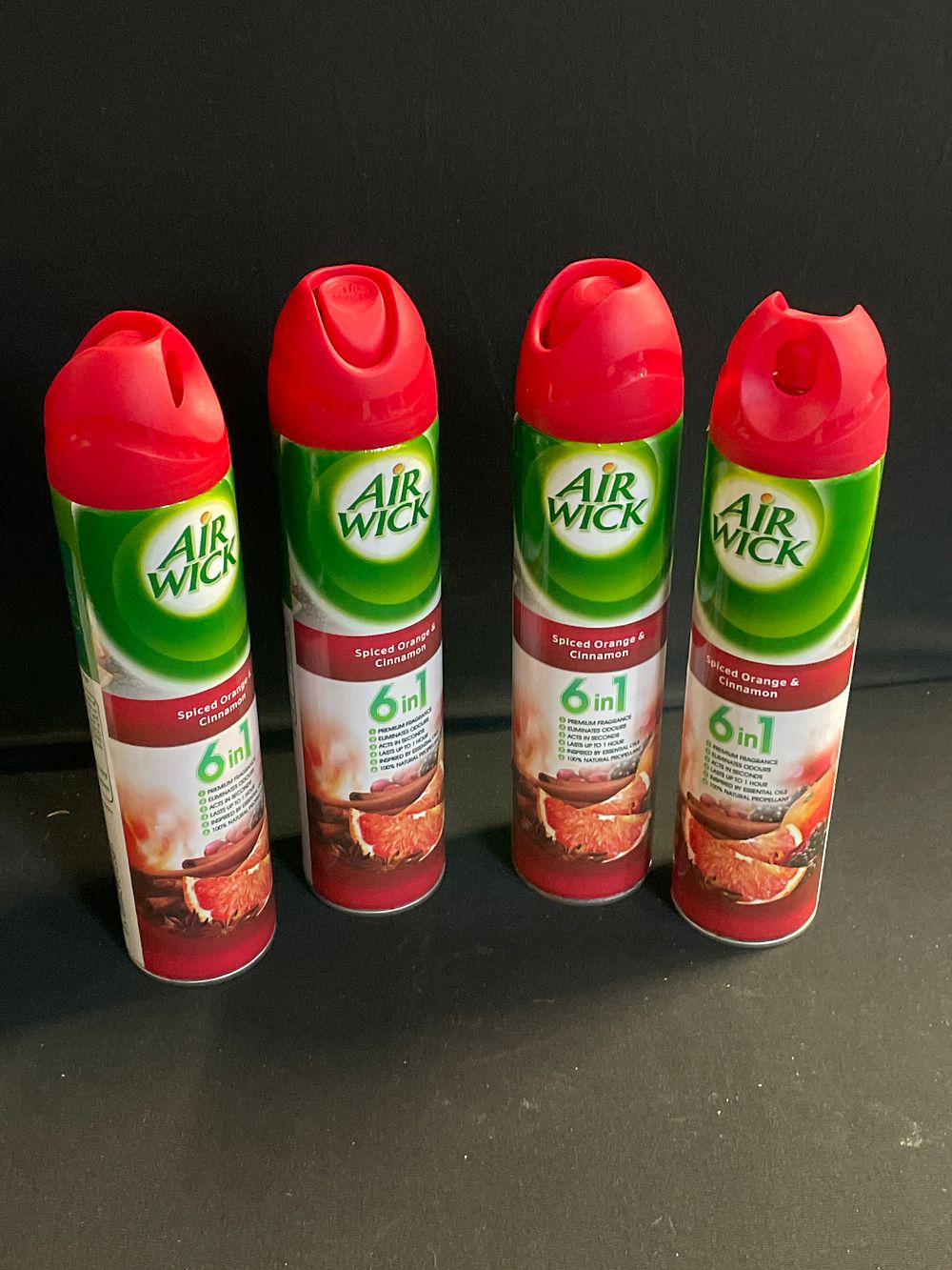 Lot 216: 4 cans of air wick spiced cinnamon and orange air freshener