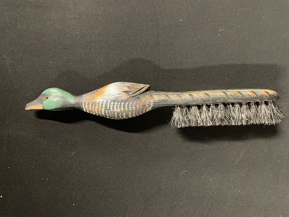 Lot 313: Duck handled clothes brush