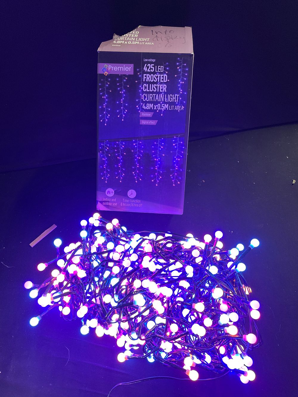Lot 319: 425 rainbow frosted cluster curtain lights