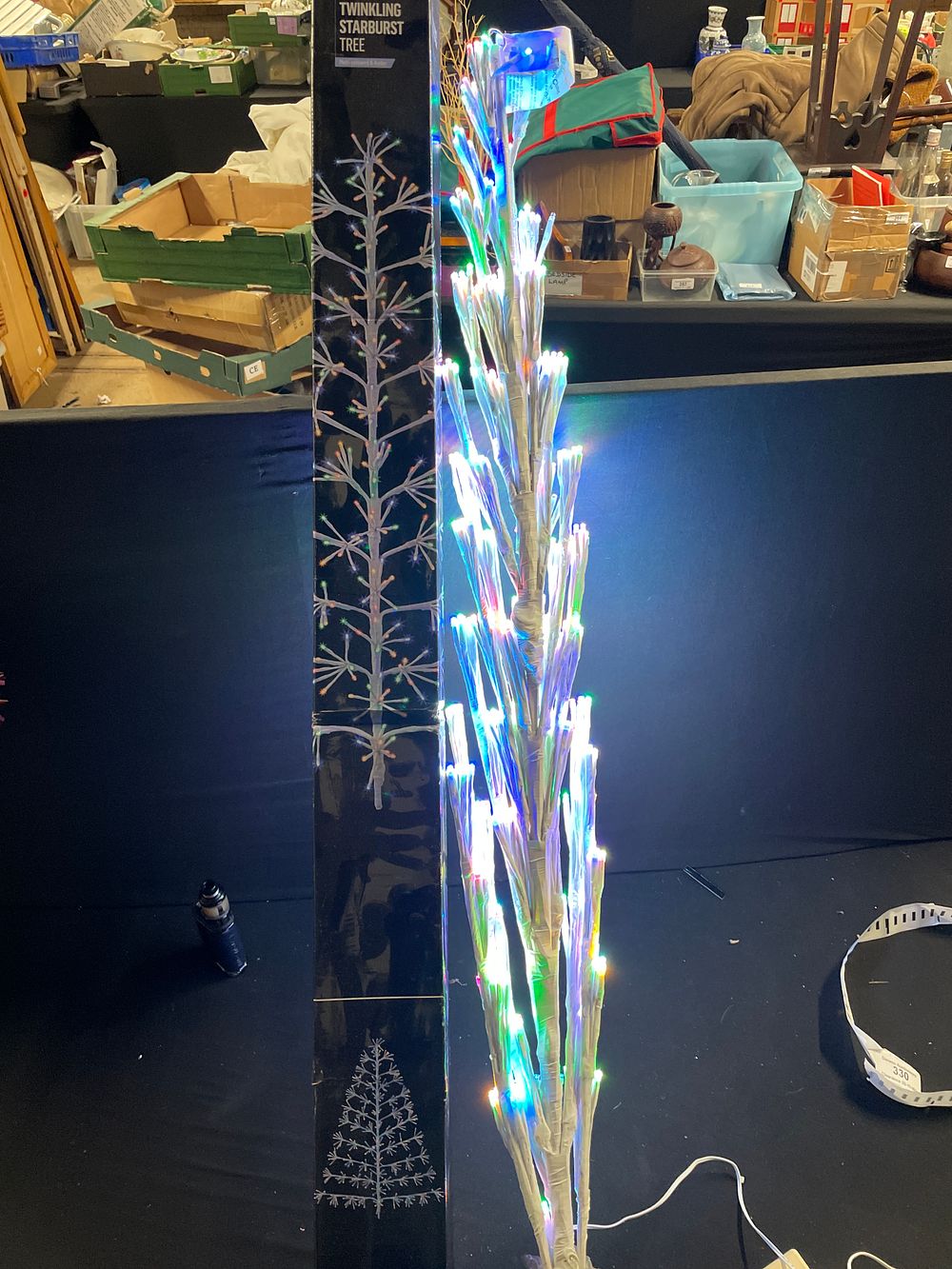 Lot 326: 1.2mtr twinkling starburst multicoloured LED tree