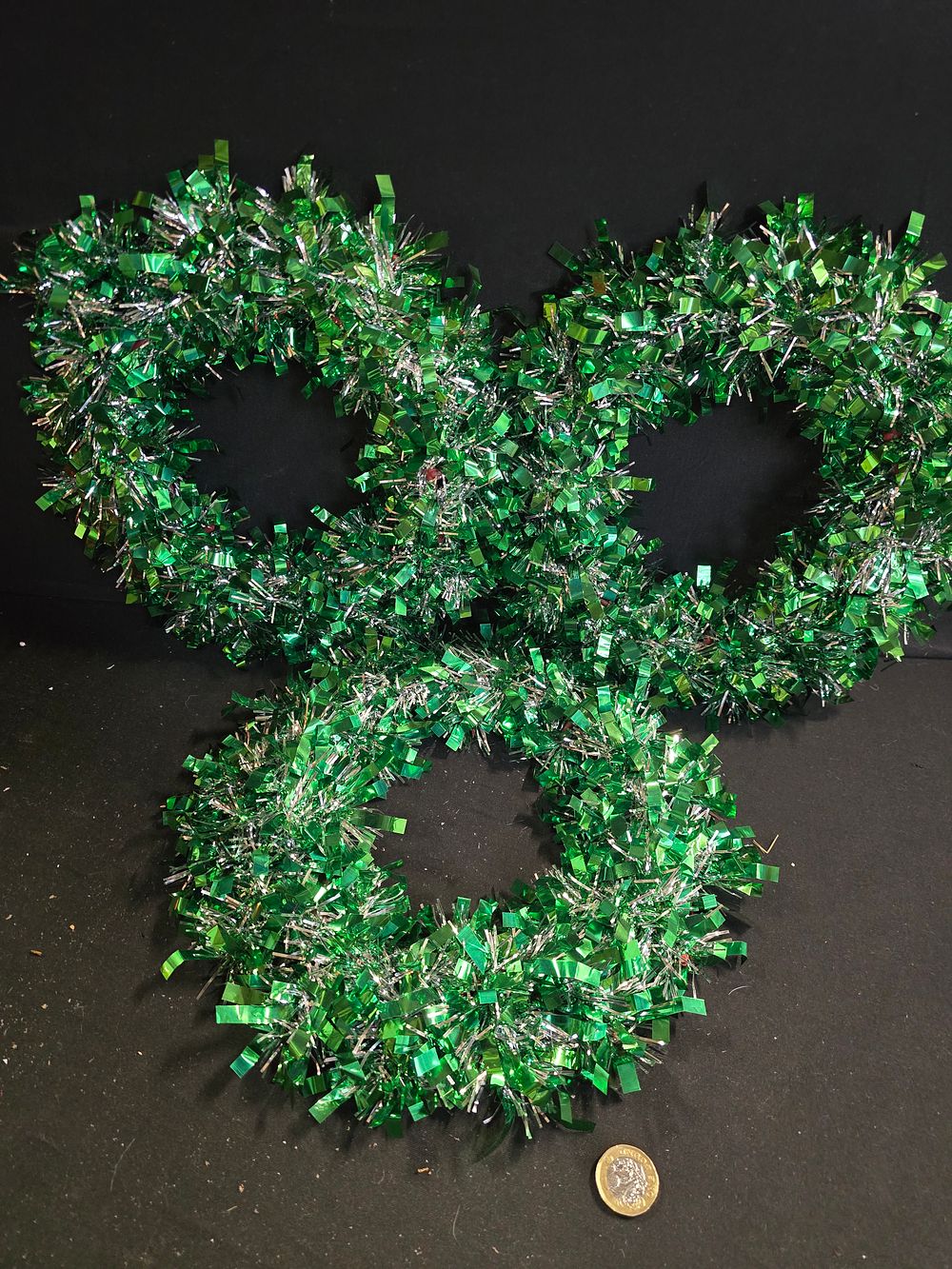 Lot 343: Three christmas green and silver tinsel wreaths