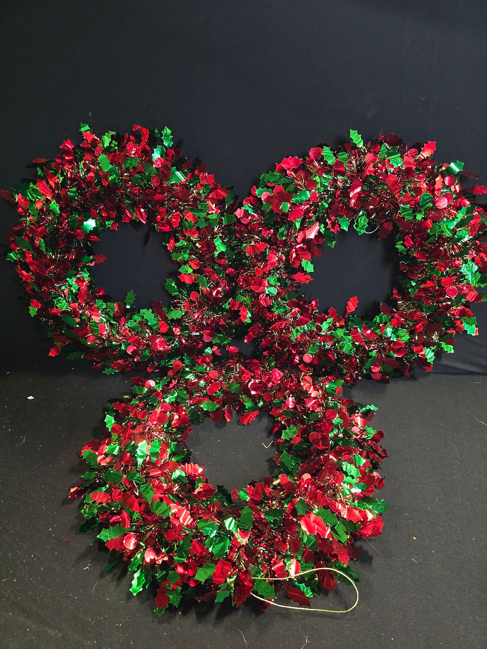 Lot 346: Three green and red circular tinsel wreaths