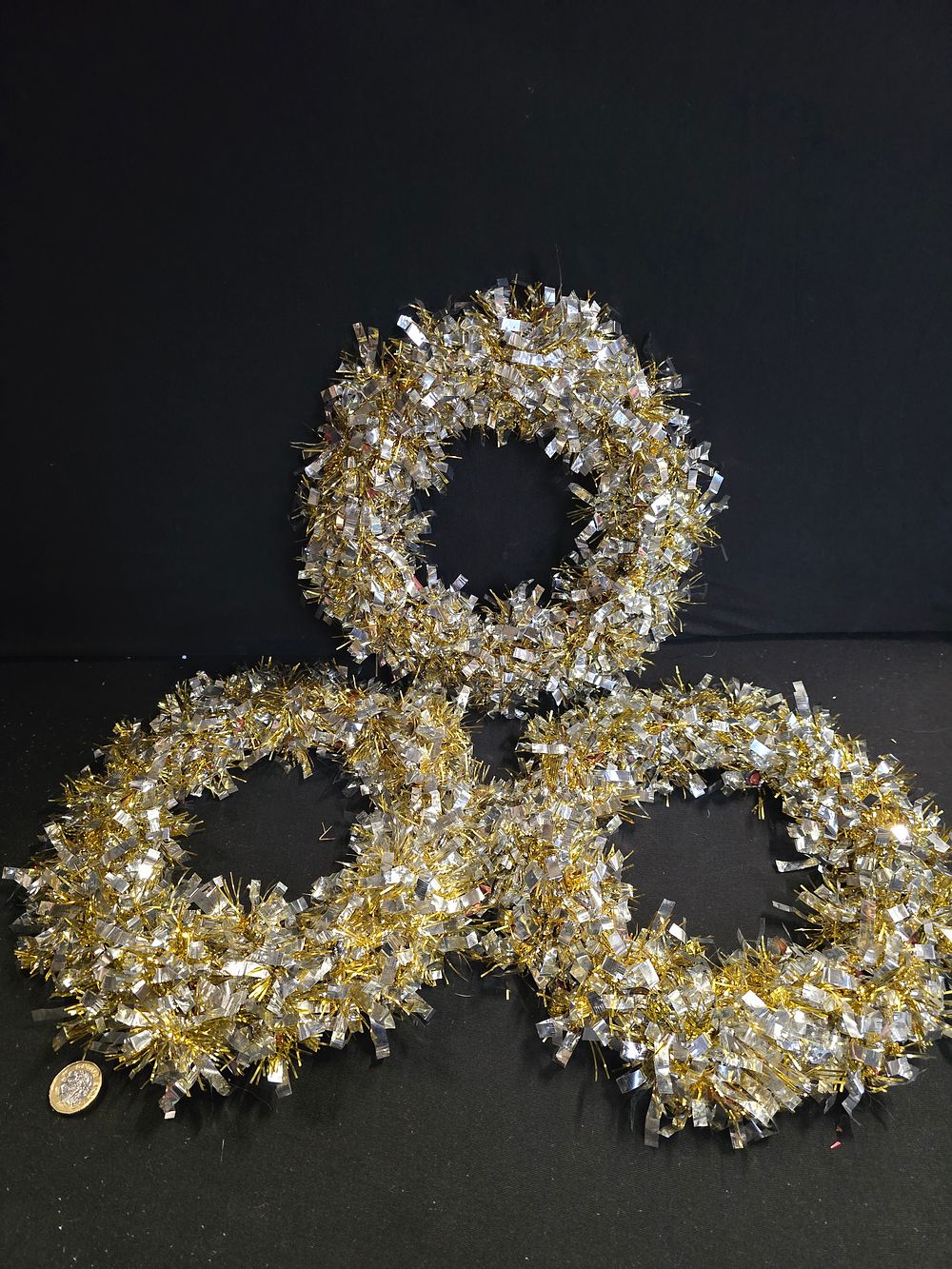 Lot 350: Three silver and gold circular tinsel wreaths