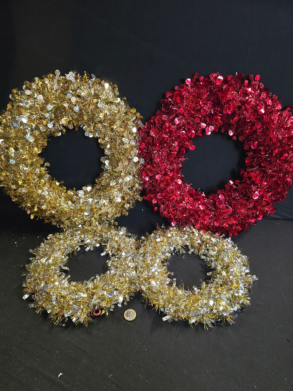 Lot 351: Four tinsel circular tinsel wreaths
