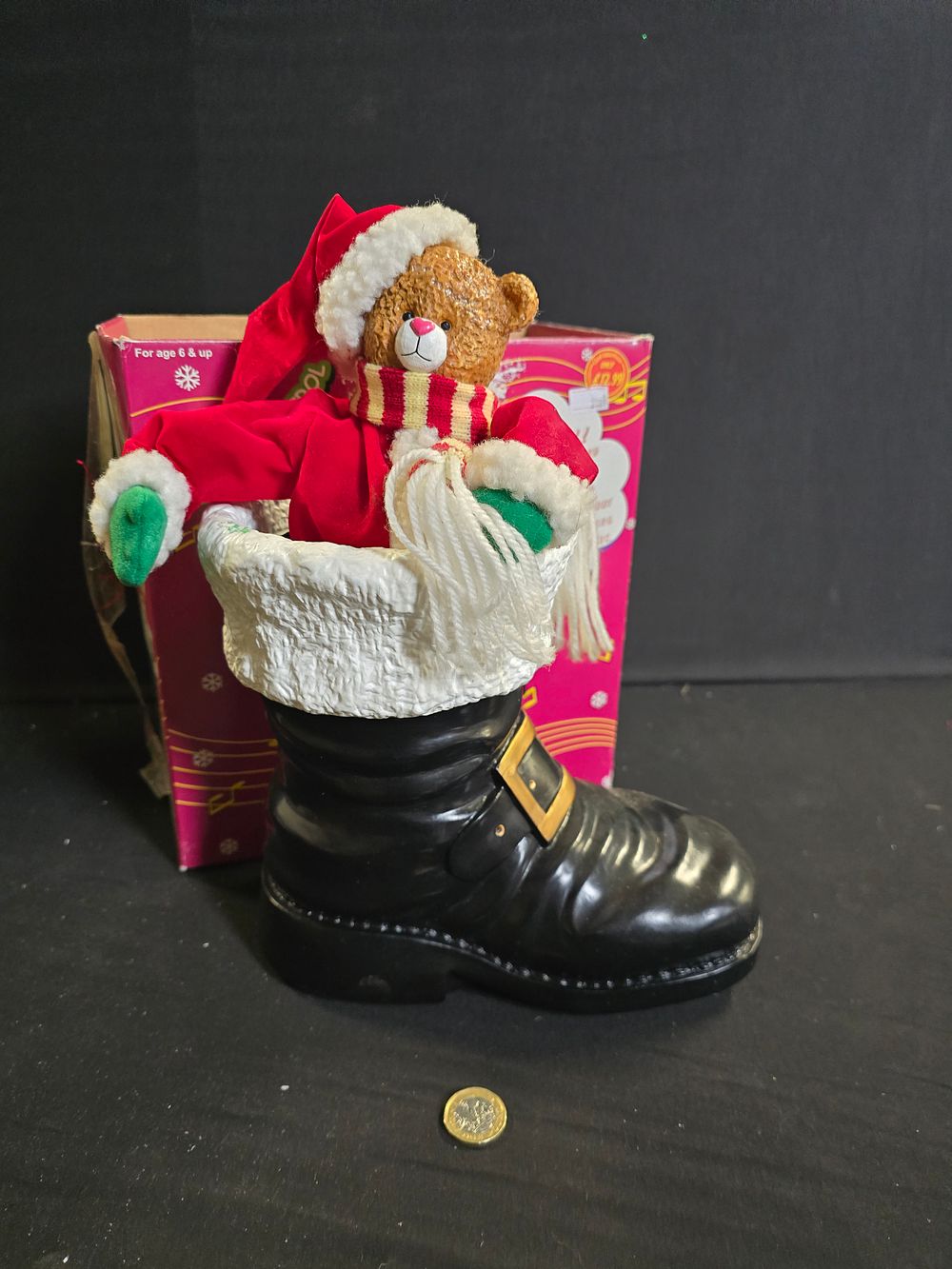 Lot 362: Musical animated Christmas bear in a boot
