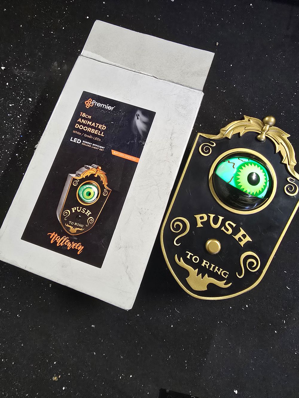 Lot 388: 18cm animated doorbell.  LED eye white and green.  Working